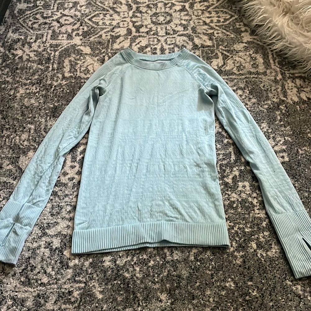 Light blue long sleeve Lululemon top / size 2 / good condition/ discontinued